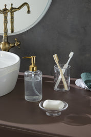 Glamis Clean Model Banyo Takımı 3'lü Set, banyo tezgahında yer alan el yapımı cam ürünleri ile estetik bir dokunuş sağlıyor. Set, sıvı sabunluk, diş fırçalık ve katı sabunluk içeriyor.