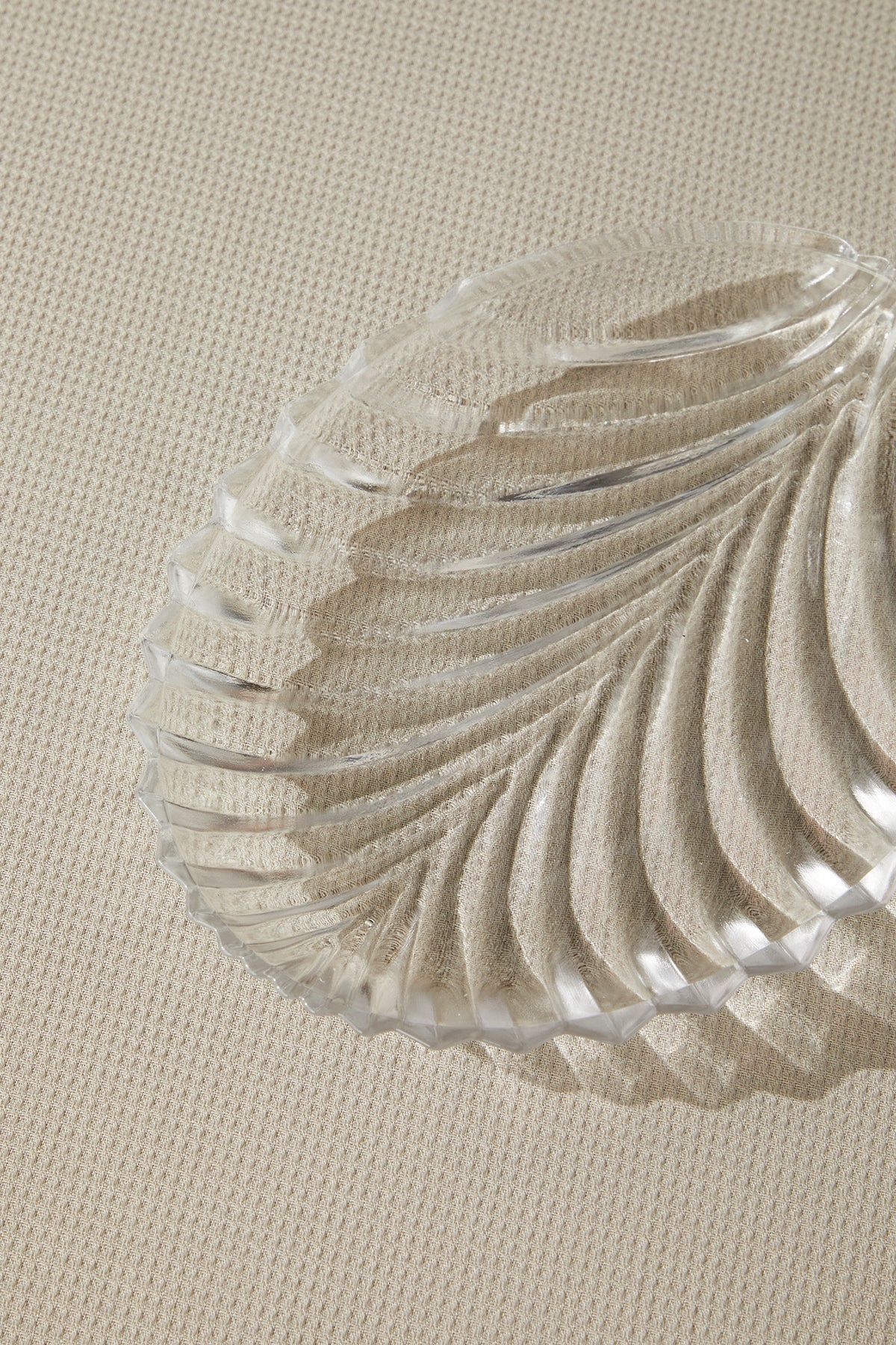 a close up of a glass plate on a table